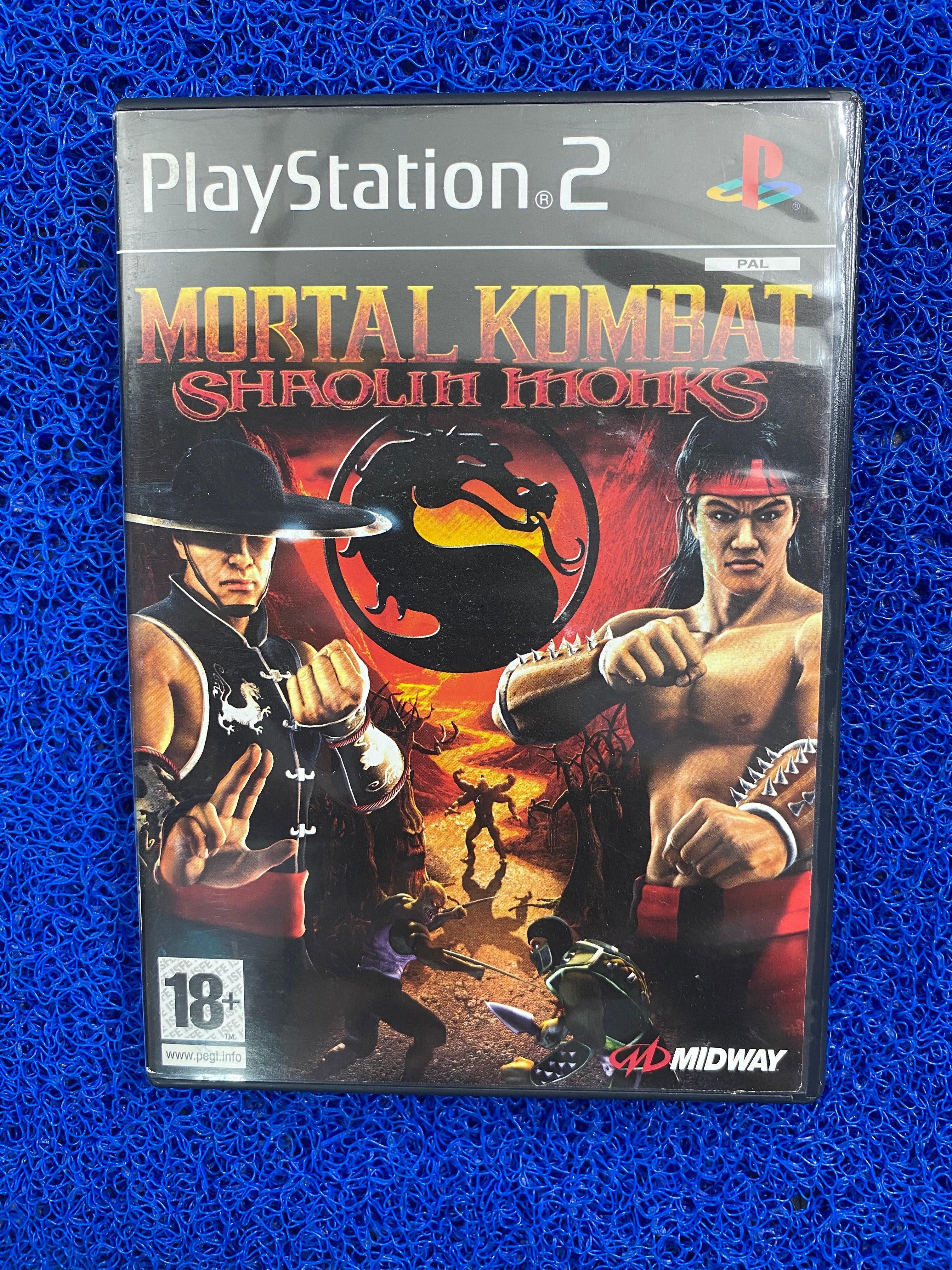 PS2# Mortal kombat shaolin monks (E)